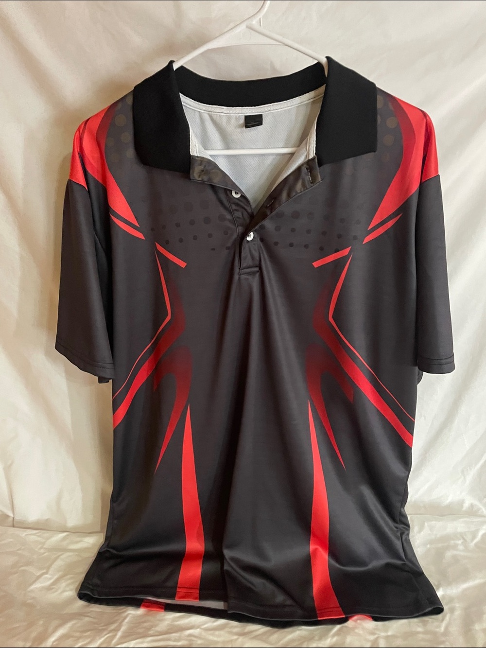 Men's Black Polo with Red Graphic Accents